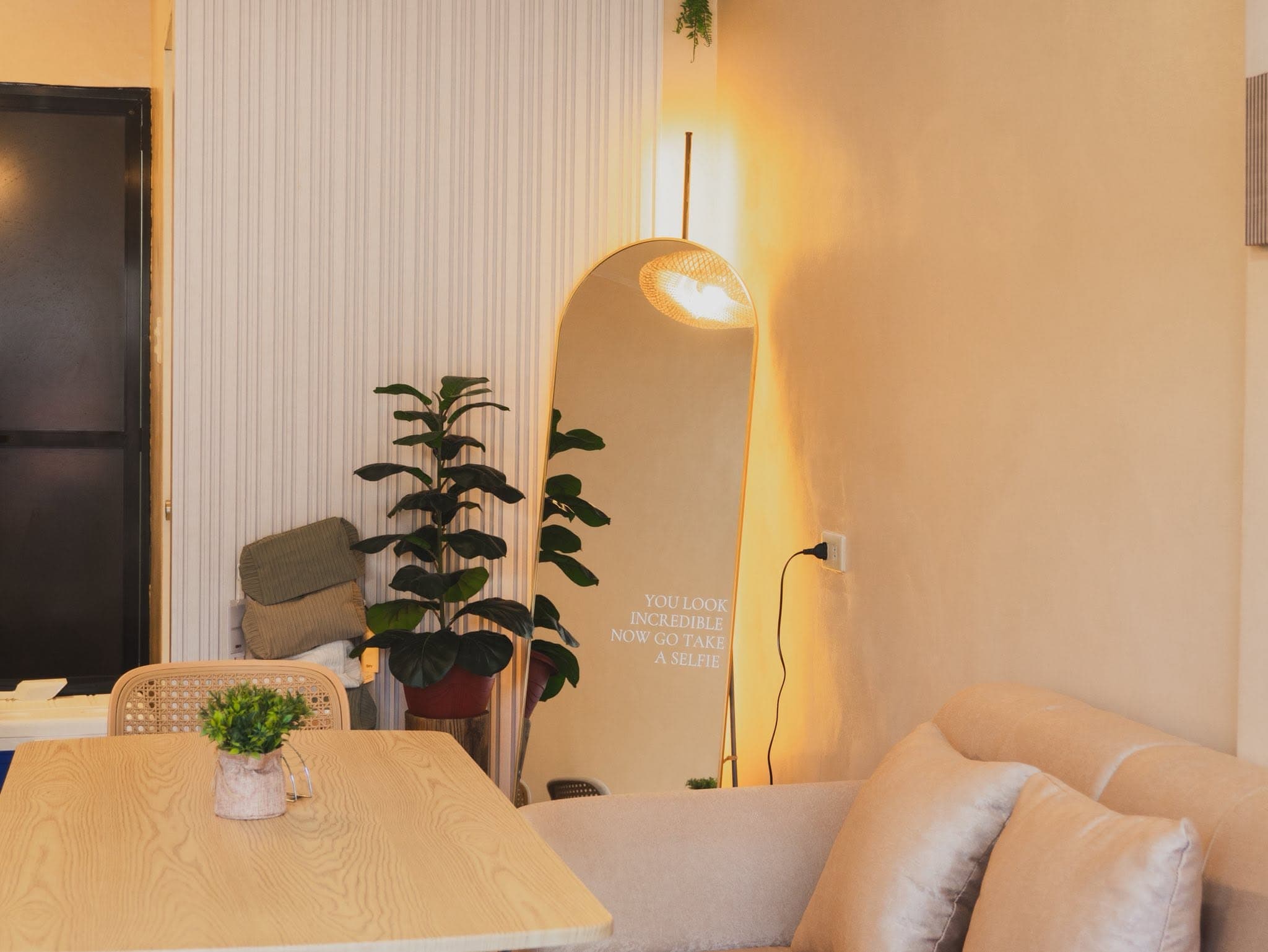 BLCK SUGAR mirror corner with warm wall lighting